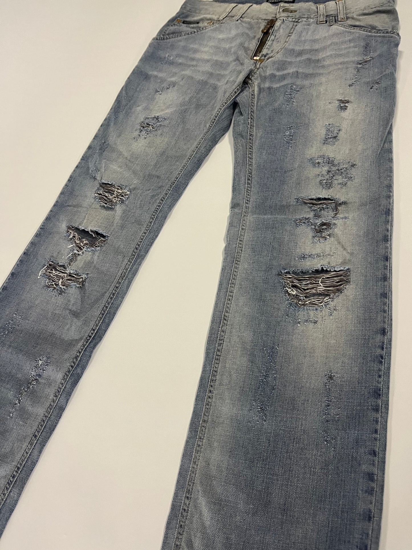Dolce & Gabbana Gold Plaque Ripped Denim Jeans