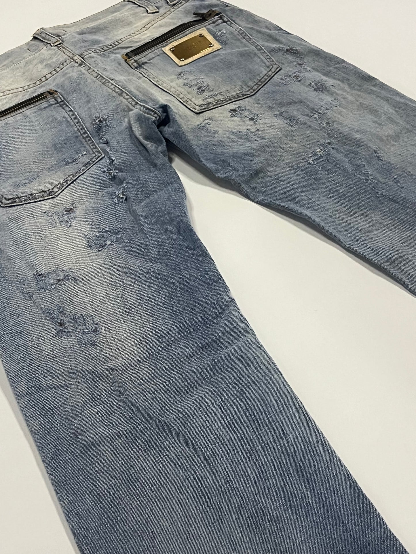 Dolce & Gabbana Gold Plaque Ripped Denim Jeans