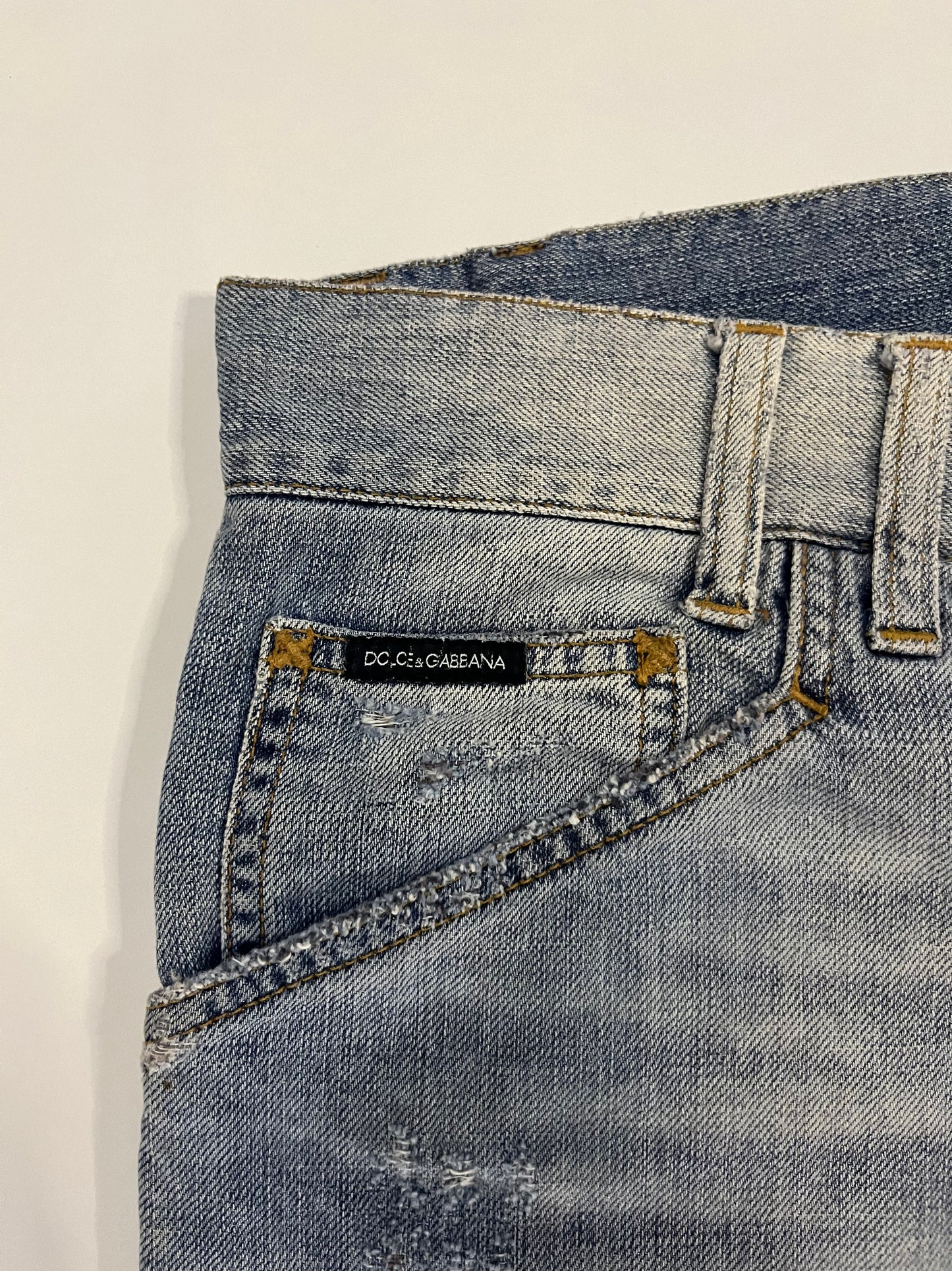 Dolce & Gabbana Gold Plaque Ripped Denim Jeans