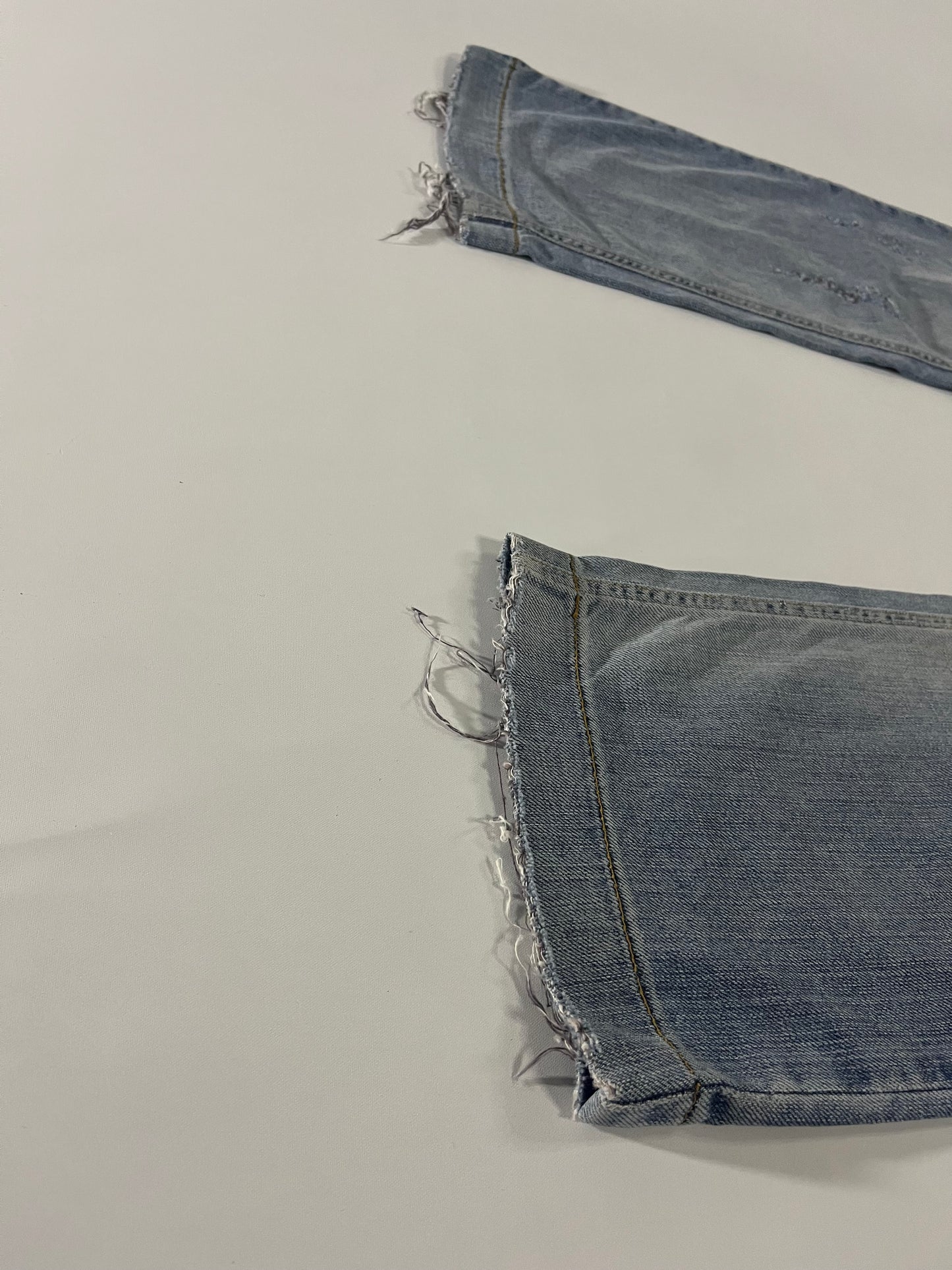 Dolce & Gabbana Gold Plaque Ripped Denim Jeans